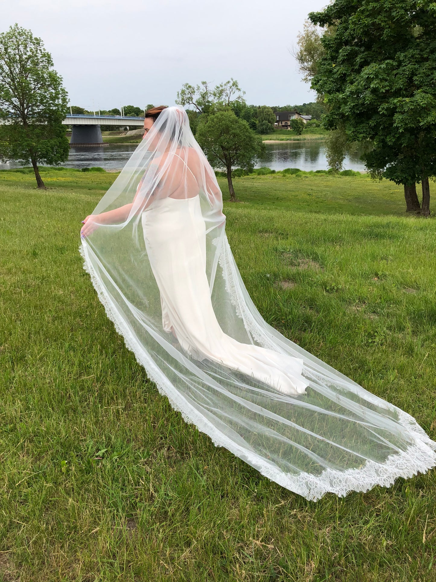 Single tier cathedral lace bridal veil in light ivory, handcrafted, side view