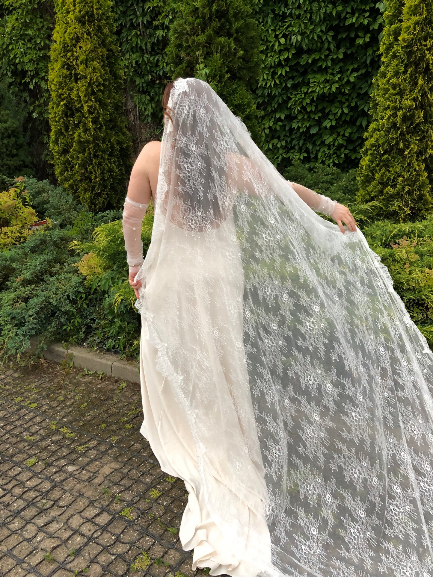 Ivory full Chantilly lace mantilla veil, floral pattern, detail view