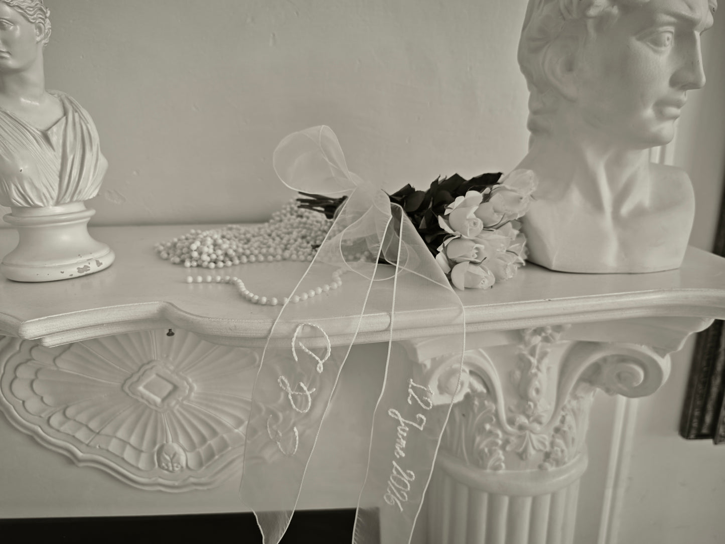 Ivory organza wedding sash with custom embroidered text, close-up detail