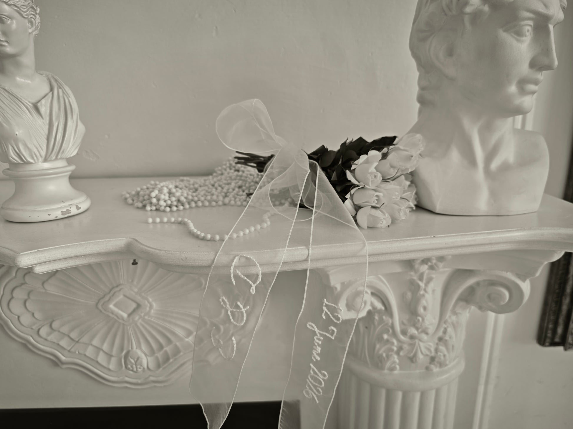 Ivory organza wedding sash with custom embroidered text, close-up detail