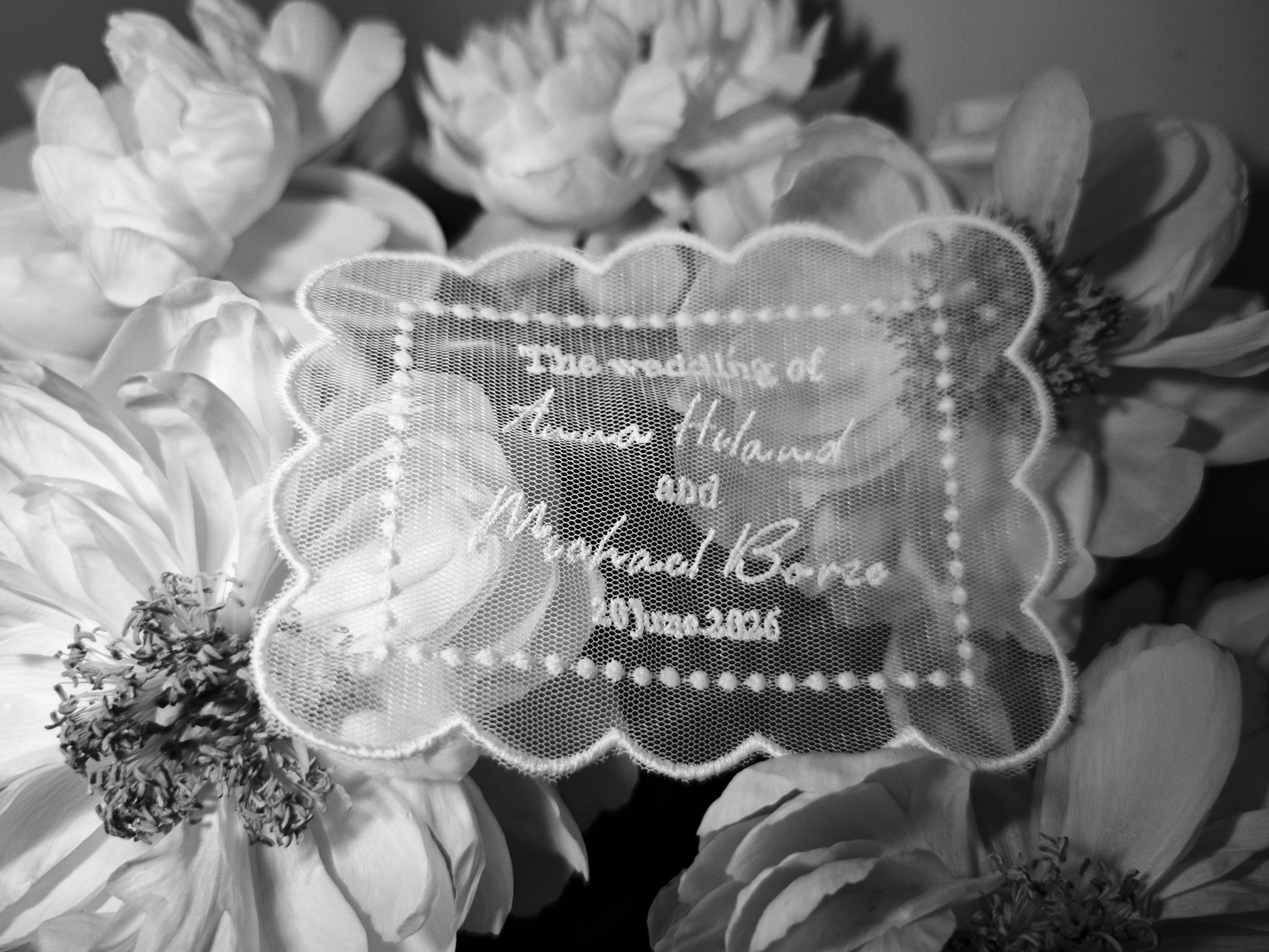 Tulle wedding invitation with embroidery, personalized names and date, ivory, flat lay