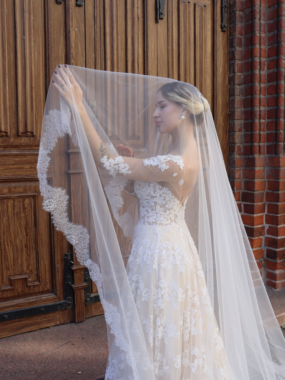 Floral lace edge of the blush Camelia wedding veil, hand-sewn